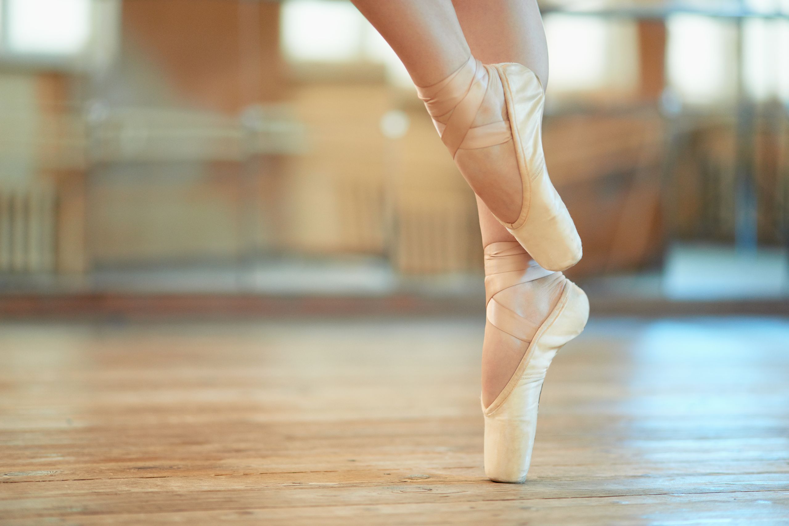 beautiful legs of a dancer in pointe